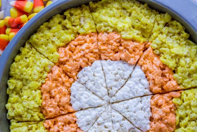 Halloween Rice Krispie Treats (Candy Corn Shape!) from The Food Charlatan. Halloween Rice Krispie Treats are perfect for a Halloween party! The kids will love the Candy Corn shape. Not only are they SO easy, but they are the BEST recipe for Rice Krispies treats! So incredibly gooey. Easy Halloween treats are a lifesaver! #rice #ricekrispies #halloween #halloweentreat #best #easy #ideas #marshmallow #microwave #decorated #gooey #forparty #ideasforkids #treats #snacks #foradults #cute #fun #diy halloween rice krispie treats