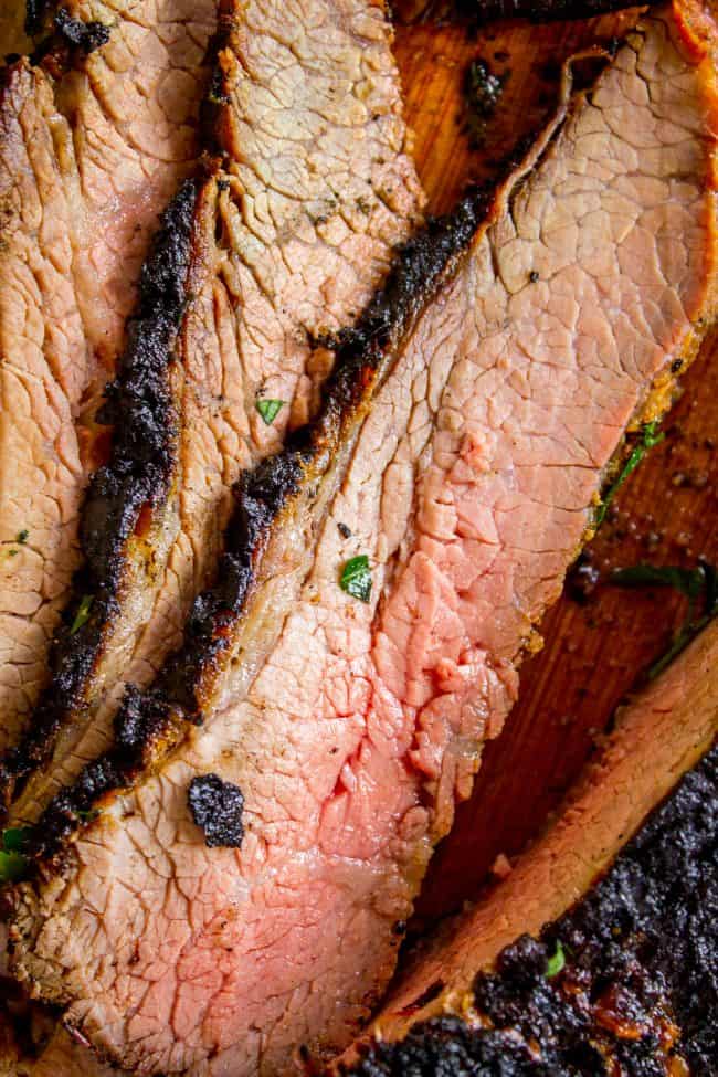 Tri tip recipe cut in long, thin slices, medium rare.