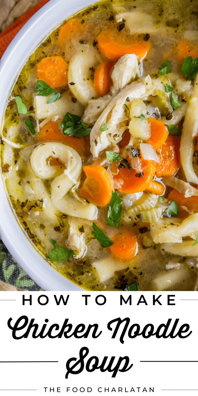homemade chicken noodle soup in a white bowl.