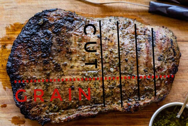 How to Cook Flank Steak (Grilled or Oven Broiled) from The Food Charlatan. Flank Steak is incredibly tasty when done well, but can be really easy to mess up. I will show you all my tips to get a flavorful, juicy, and tender flank steak, grilled outside or under the broiler! Using a great marinade, slicing correctly, and cooking hot and fast are the secrets to a fabulous flank steak. #flank #flanksteak #steak #beef #grill #grilled #easy #recipe #summer #marinade #oven #howtocook #chimichurri how to slice flank steak against the grain.