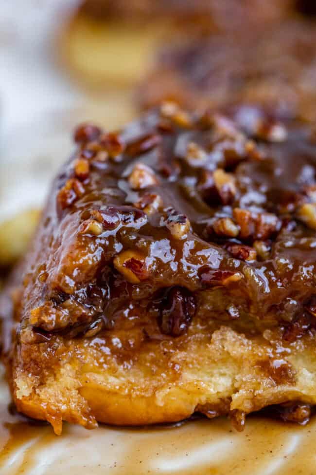 close up of caramel sticky bun with pecans.