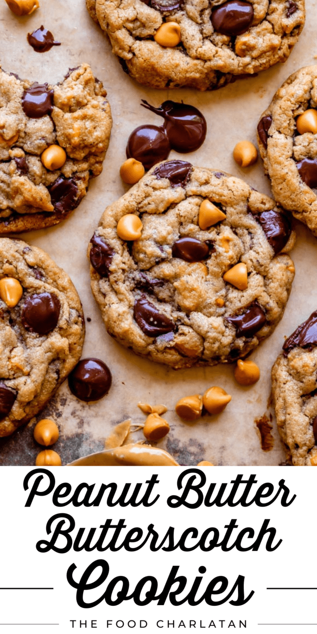 peanut butter cookies with butterscotch and chocolate chips on a baking sheet.