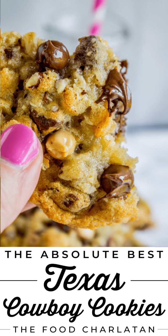 hand holding a Texas cowboy cookie.