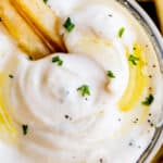 close up shot of garlic aioli recipe with french fries