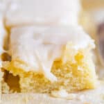 simple white cake in square pieces, arranged in rows