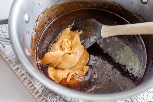 a pot of chocolate cookie batter with peanut butter