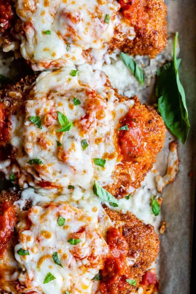 best chicken parmesan recipe on a pan shot from overhead.