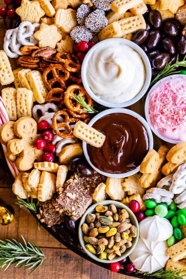 dessert platter with pretzels, shortbread, chocolate and peppermint dips, meringues, etc.