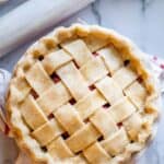 raw lattice pie crust with crimped edges