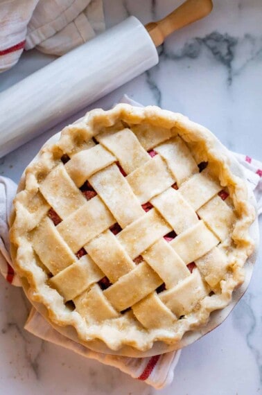 raw lattice pie crust with crimped edges