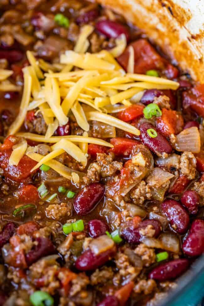 quick easy chili recipe with cheddar cheese in a pot.