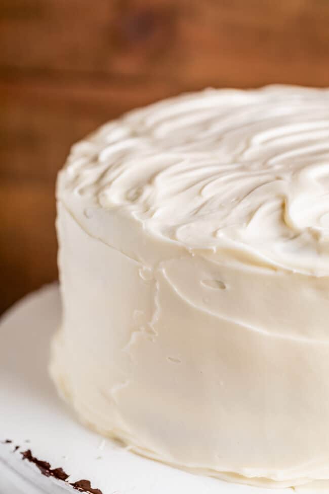homemade spice cake frosted with cream cheese frosting.