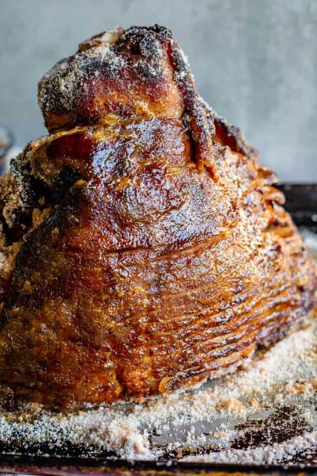 honey baked ham glaze over ham with sugar over it.