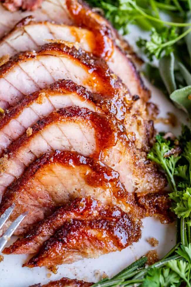 honey baked ham recipe (copycat) shown on plate sliced.