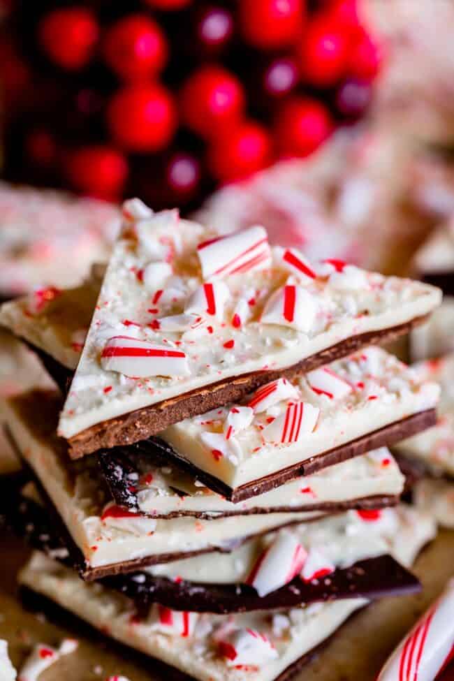 chocolate peppermint bark cut into triangles and stacked.