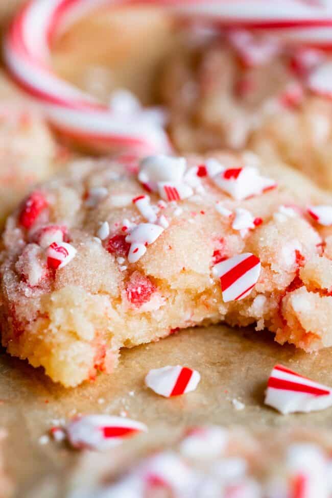 a peppermint cookie with a bite taken out of it.