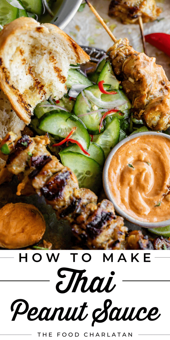 Thai peanut sauce with cucumber salad, chicken satay, and bread.