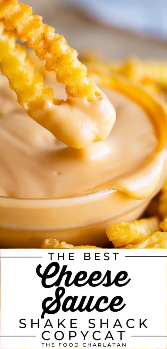 dipping crinkle fries into creamy smooth homemade cheese sauce