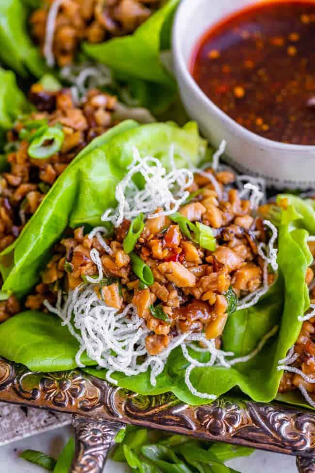 chicken lettuce wraps with fried rice noodles.