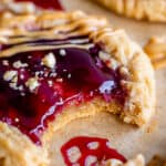 peanut butter and jelly cookies with a bite taken out