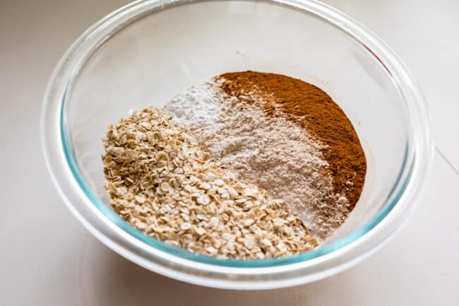 bowl of dry ingredients for cookie dough in a glass bowl.