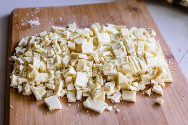 chopped white chocolate on a cutting board