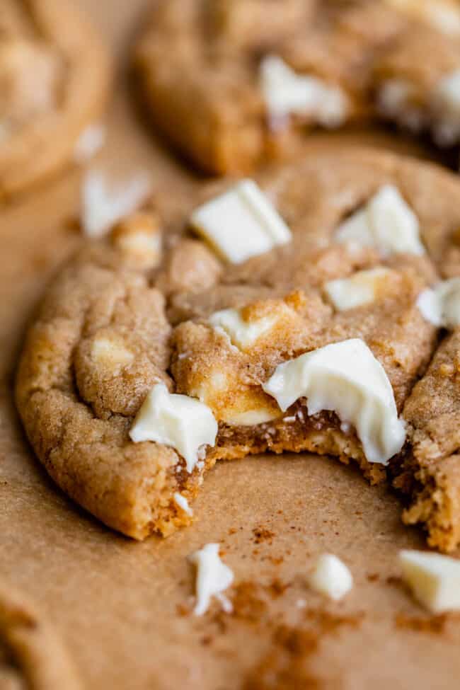 a bite taken out of white chocolate cookies