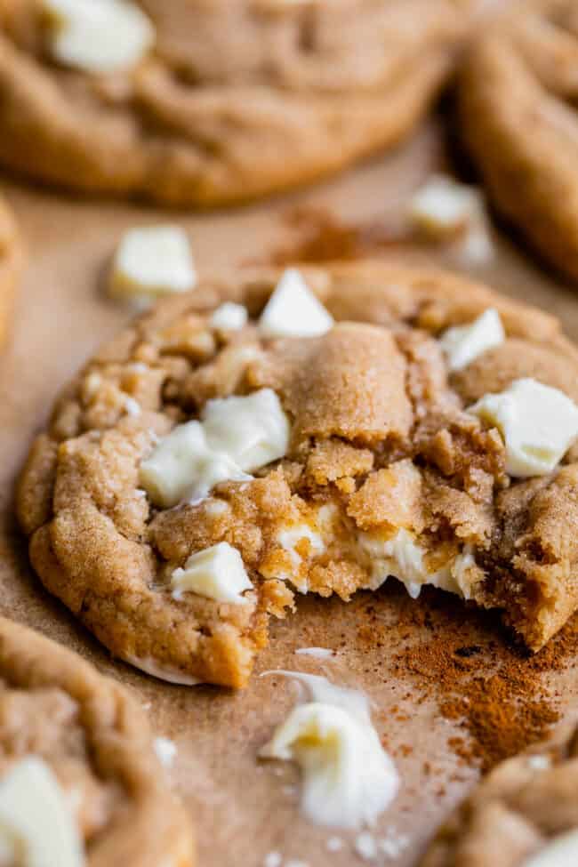 cinnamon white chocolate chip cookies with a bite taken