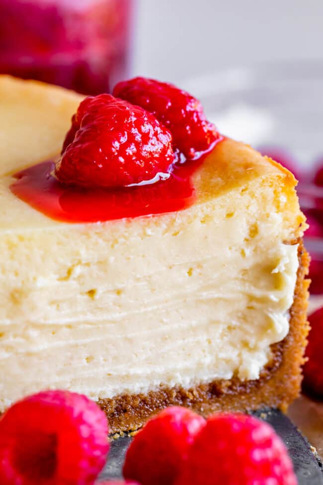 classic new york cheesecake recipe with raspberry topping.