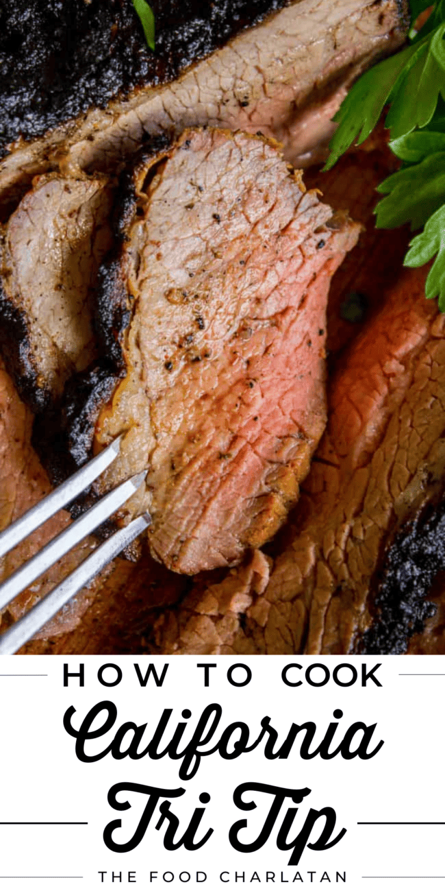 a slice of grilled tri tip with a metal fork.