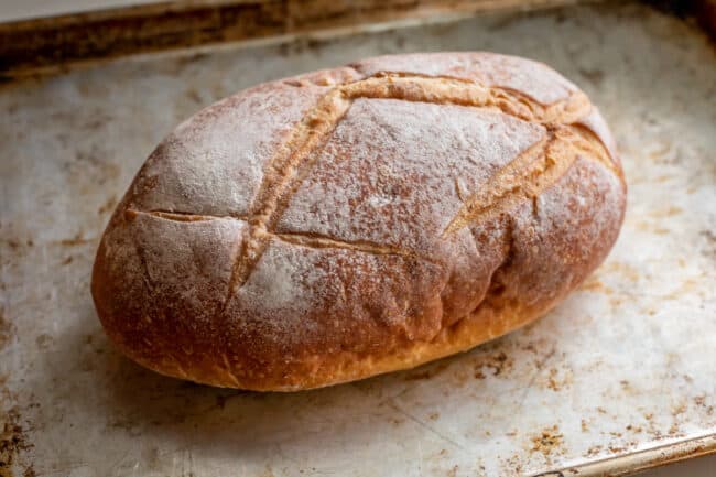 a loaf of bread on a sheet pan