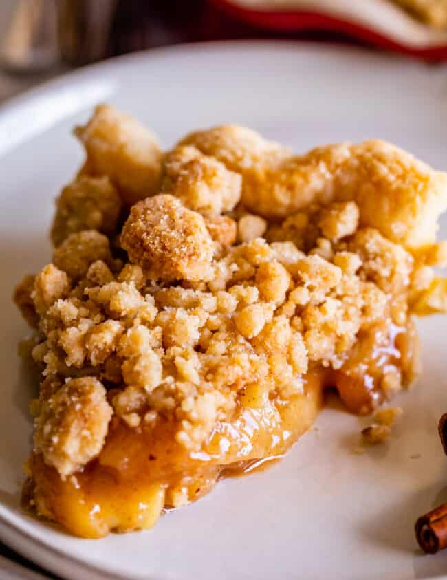 Dutch apple pie slice on a white plate.