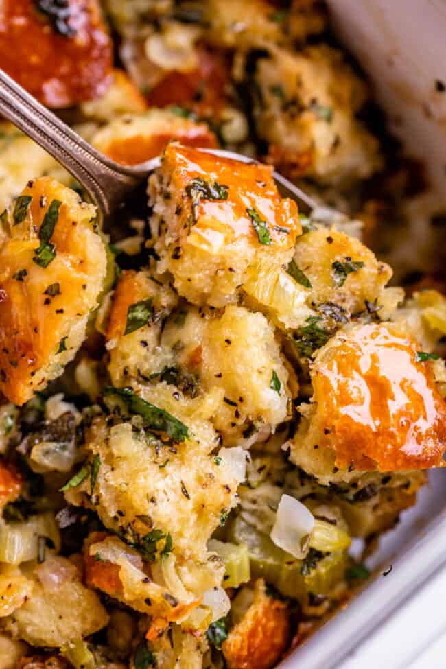 spoon digging into traditional stuffing recipe