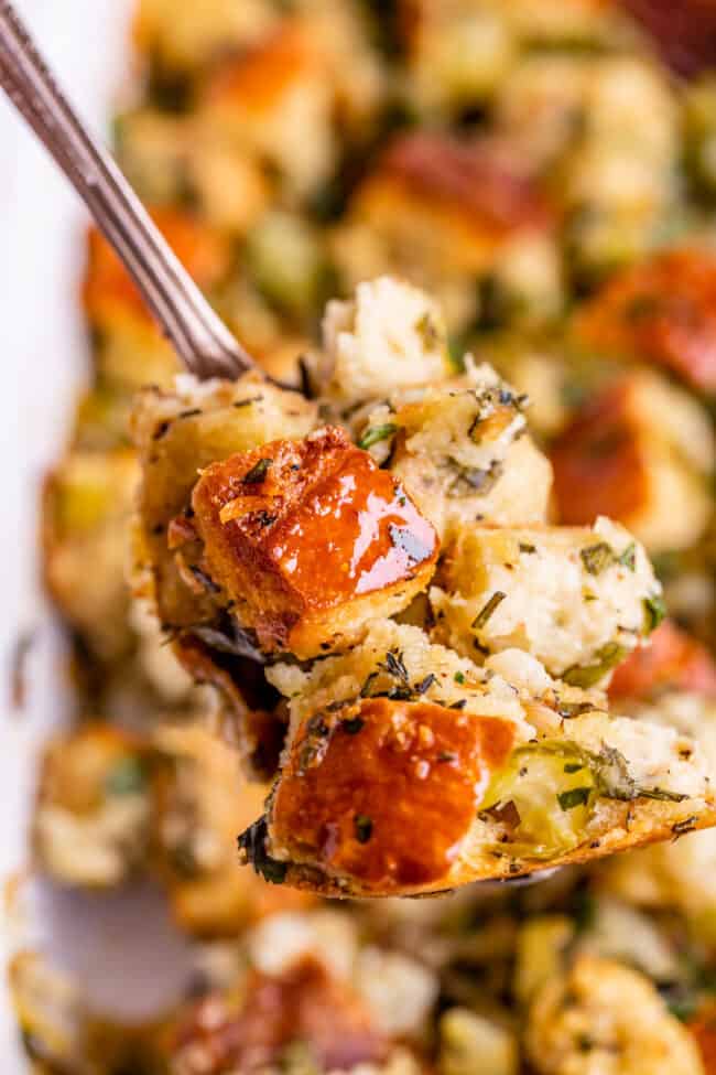 homemade stuffing recipe being lifted with a spoon