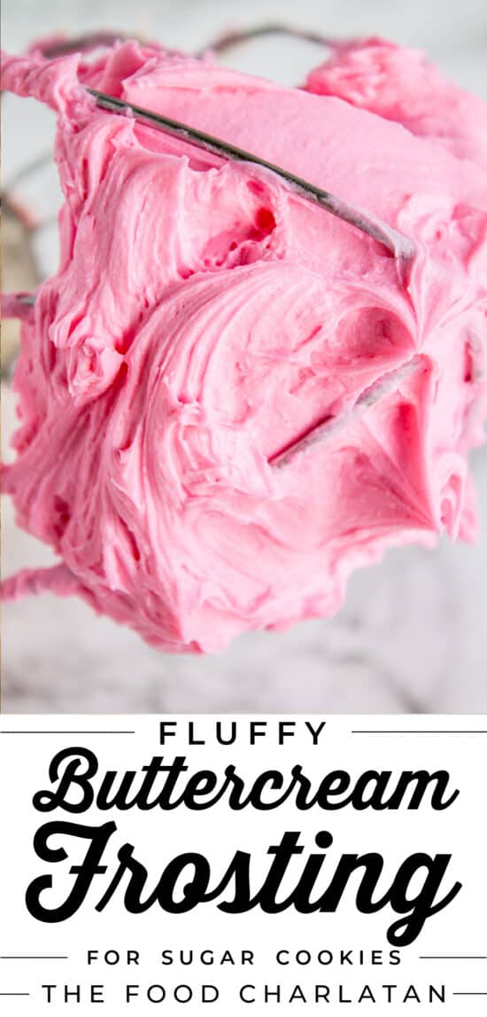 pink tinted buttercream frosting on a whisk attachment beater