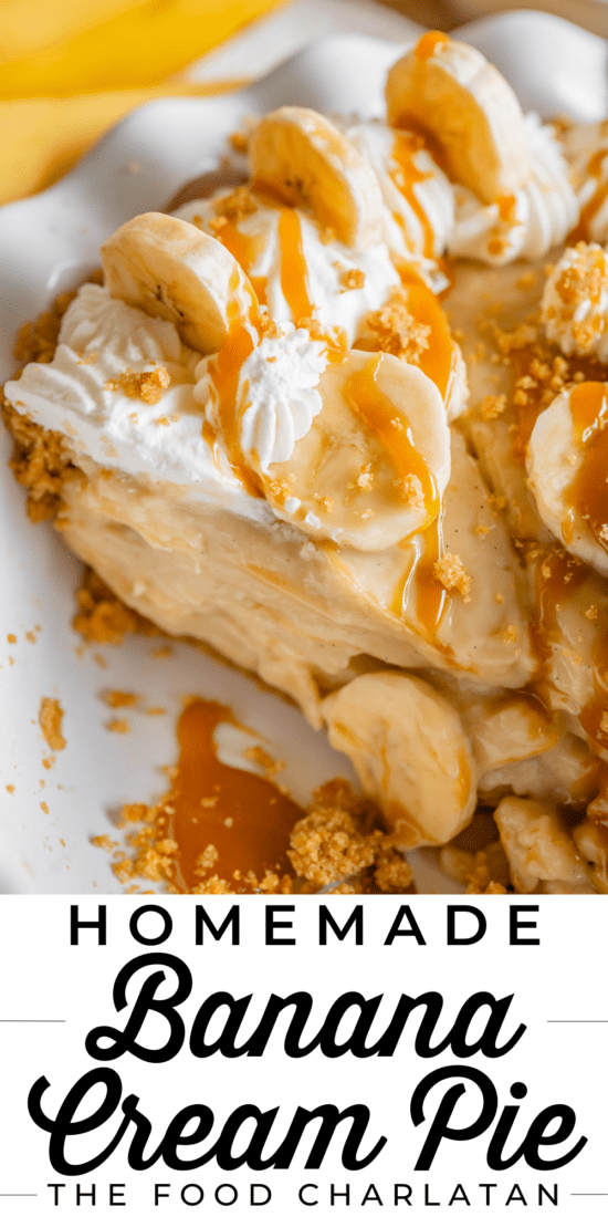 slice of banana cream pie drizzled with caramel in a white pie pan.