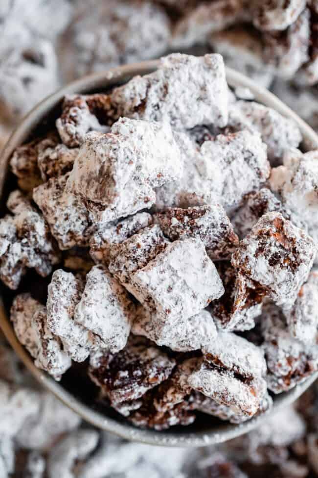 puppy chow in chunks (in a white bowl).