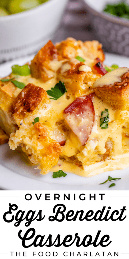 Angled shot of eggs benedict breakfast casserole on white plate.
