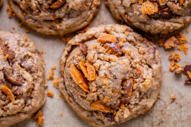 horizontal photo of peanut butter cookie with butterfingers.