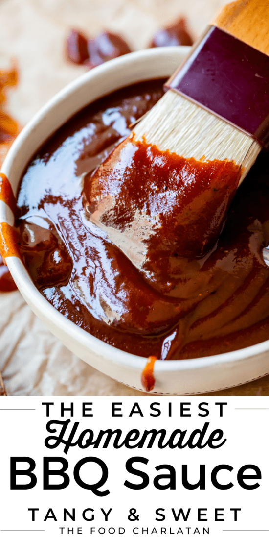 brush dipping into white bowl of barbecue sauce.