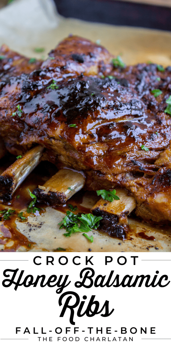 slow cooker ribs with glaze on top, sprinkled with parsley.