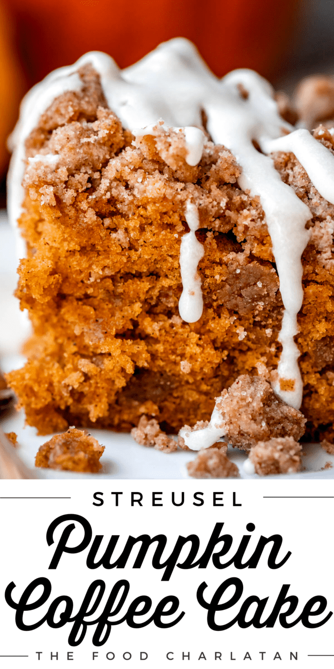 pumpkin coffee cake with glaze and streusel on a plate.