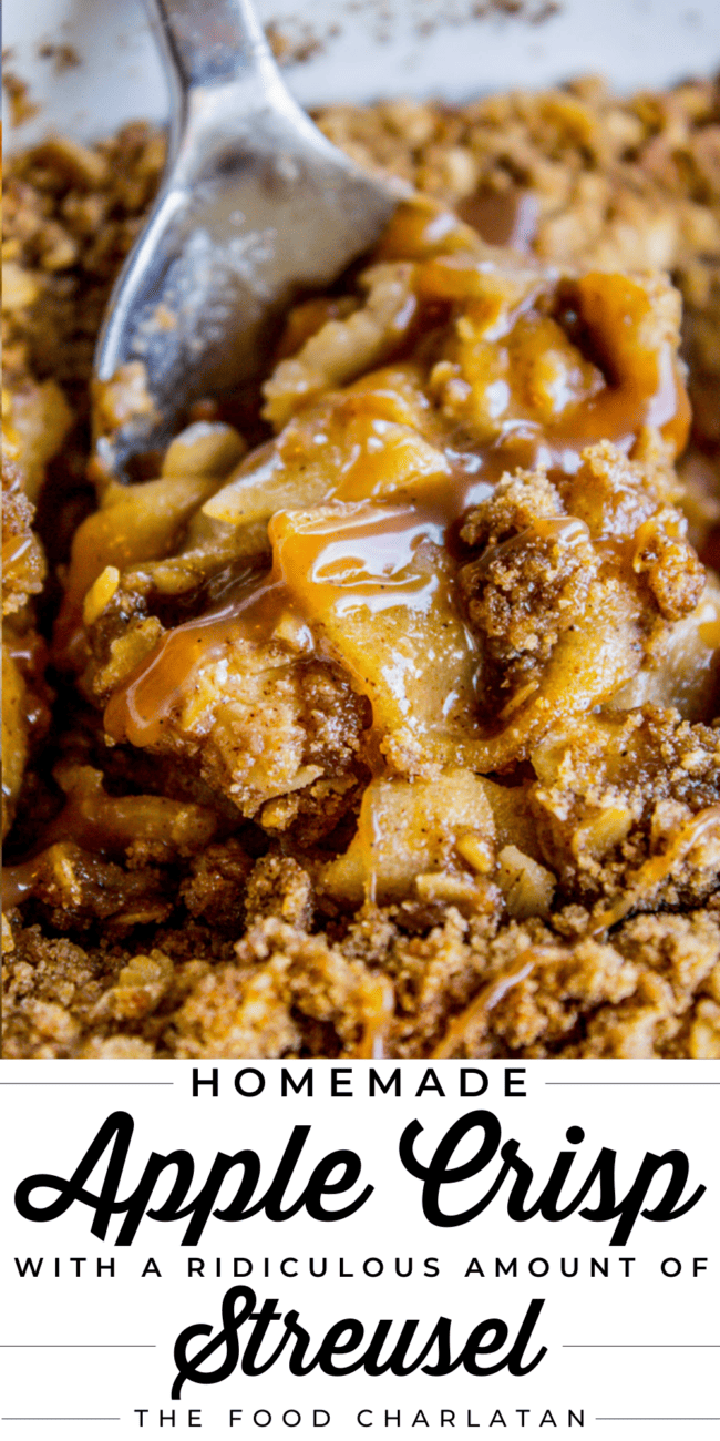 a large metal spoon dishing up apple crisp.
