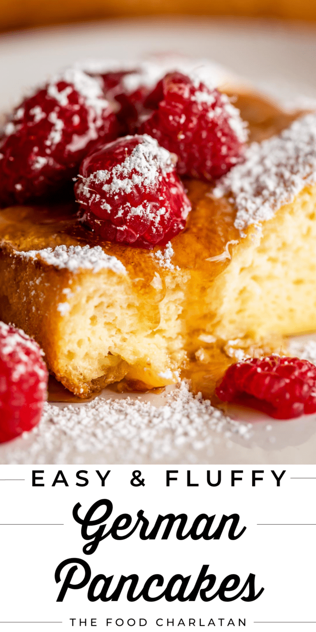 german pancakes with fresh raspberries and powdered sugar.