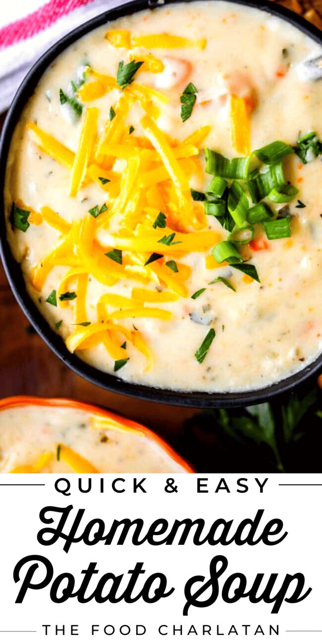bowl of potato soup topped with cheddar and green onions.