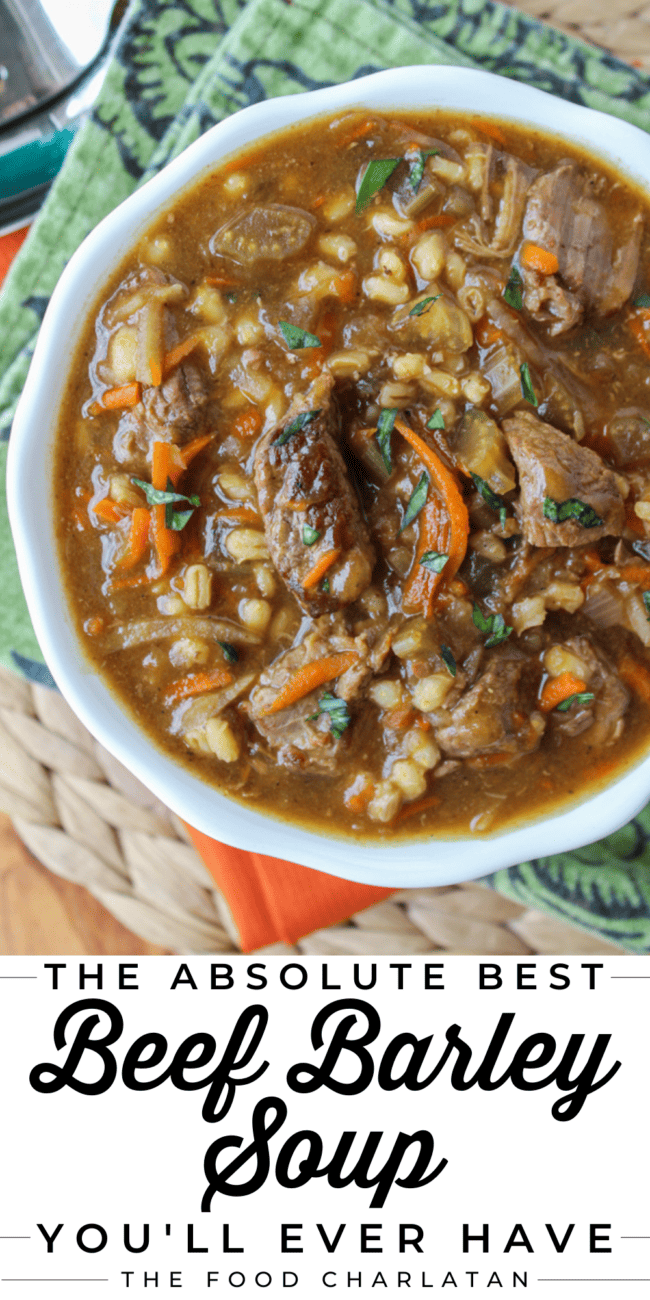 beef and barley soup in a white bowl.