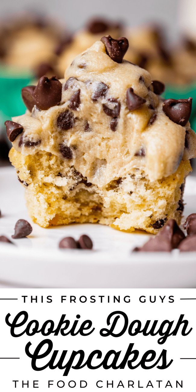 a cupcake with cookie dough frosting with a big bite taken out of it.