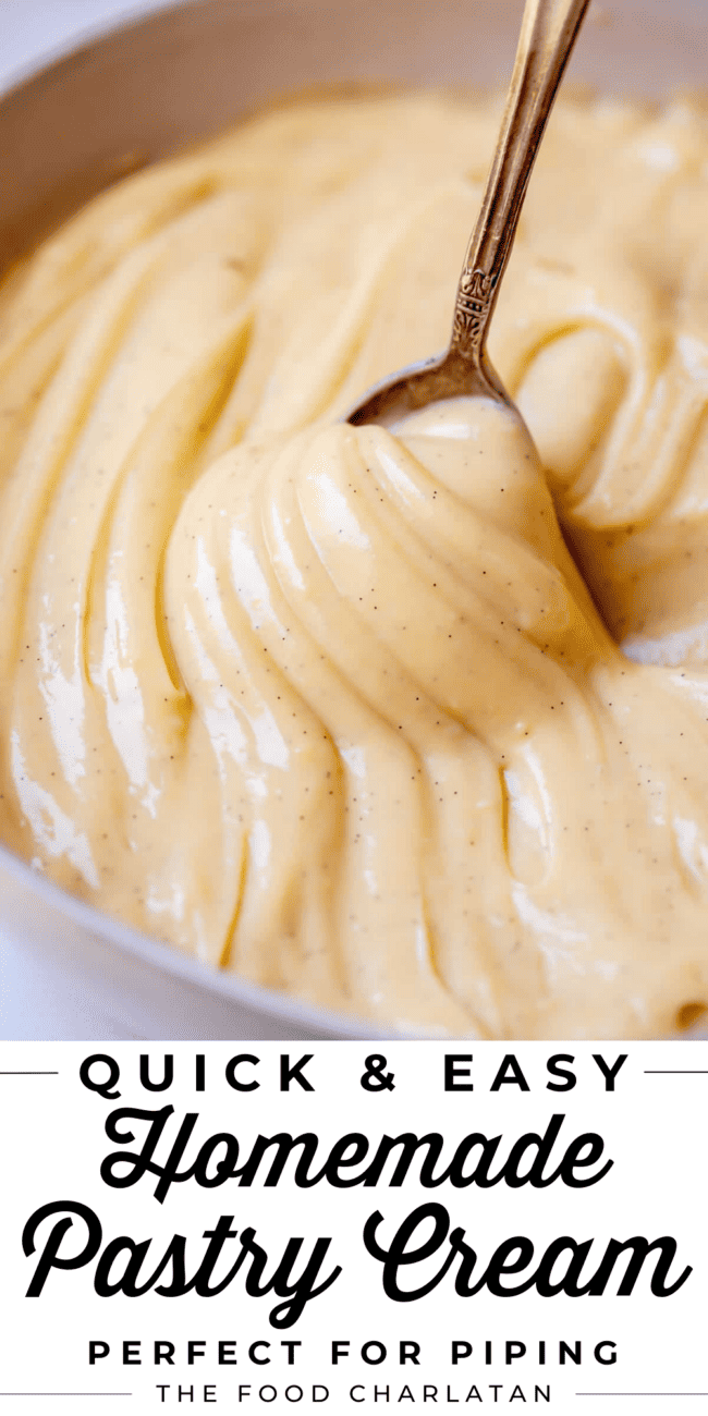 swirly pastry cream in a bowl being lifted with a spoon.