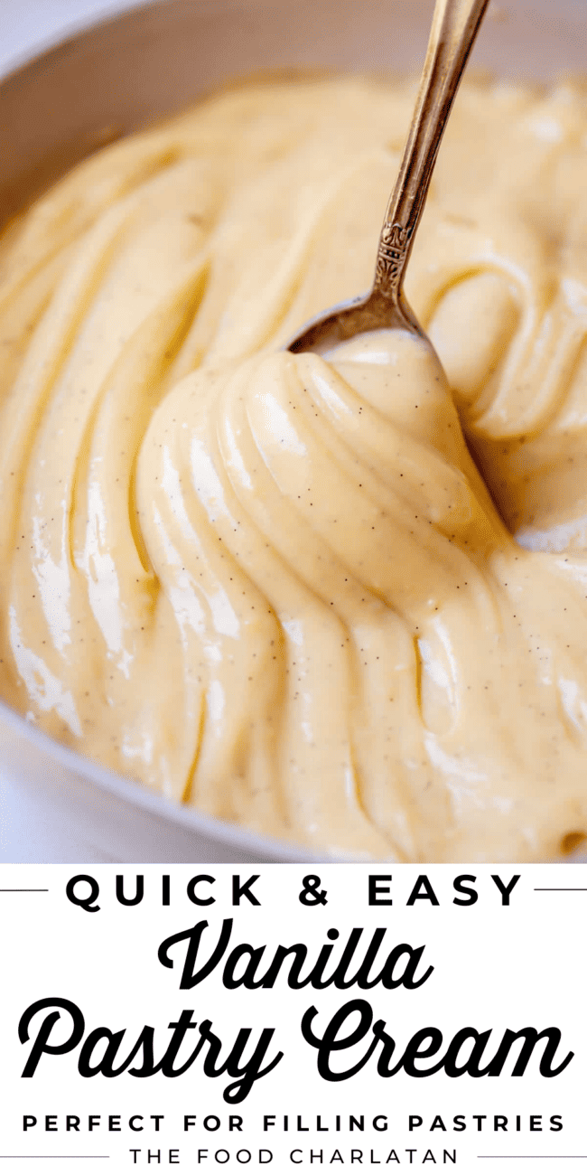 vanilla pastry cream lifted out of a bowl with a spoon.