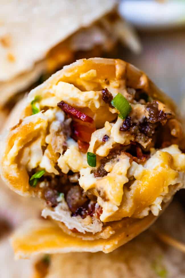 Breakfast burrito with sausage eggs and cheese.